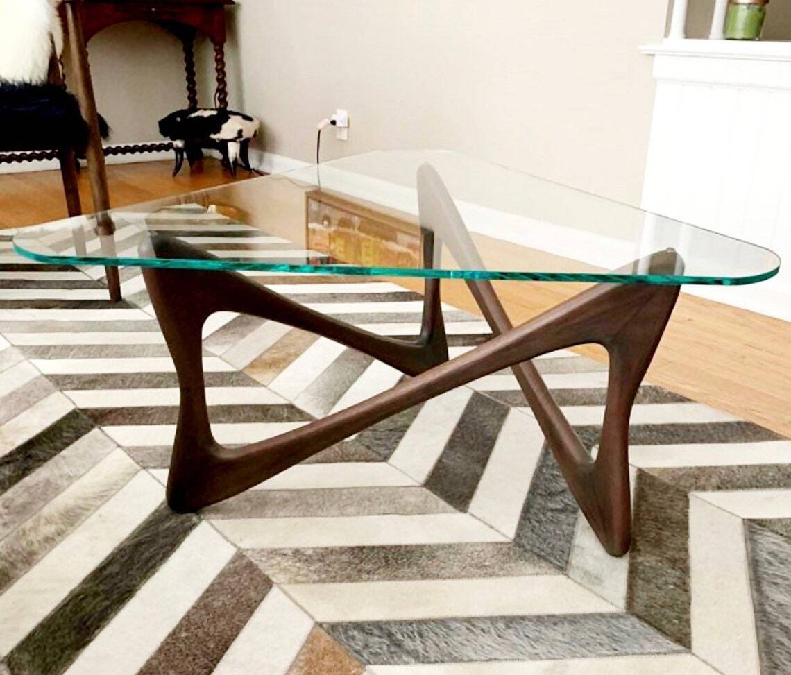 The abstract and artistic table base for glass top