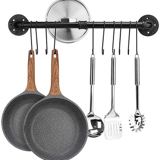 https://foter.com/photos/419/wall-mounted-cast-iron-hanging-rack.jpeg?s=b1s