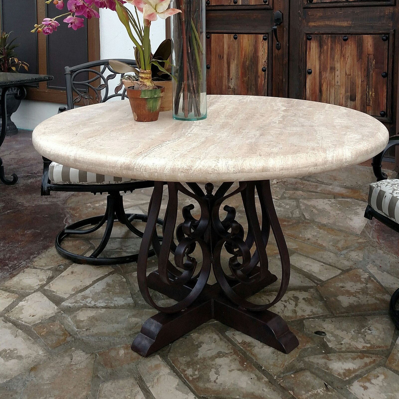 Wrought Iron Pedestal Dining Table with Travertine Top