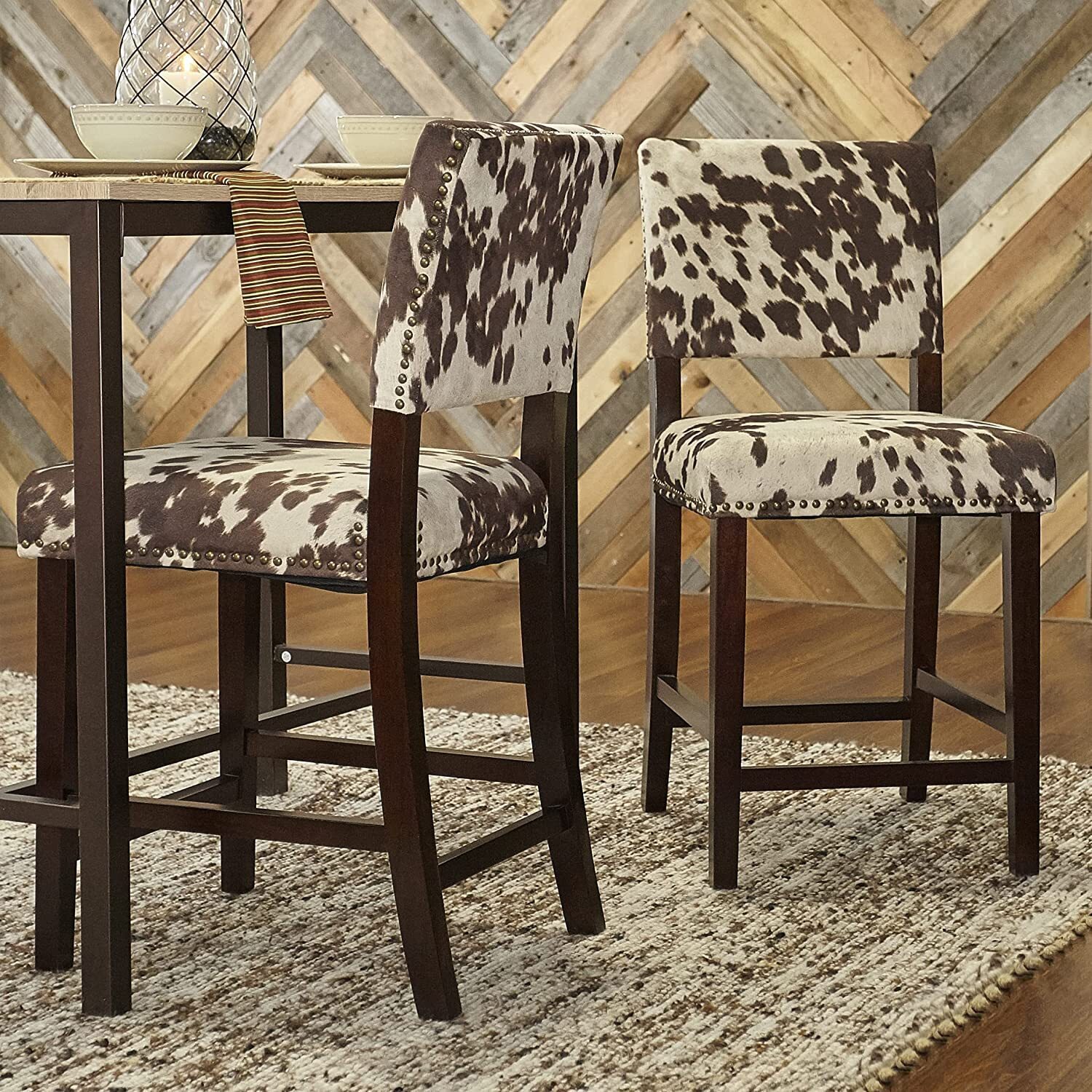 Animal print dining chairs in a counter height
