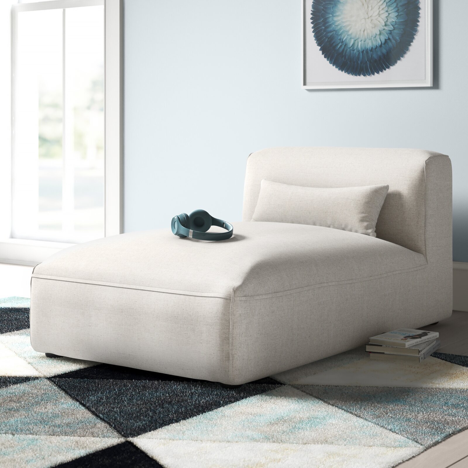 Armless white chaise lounge for casual seating