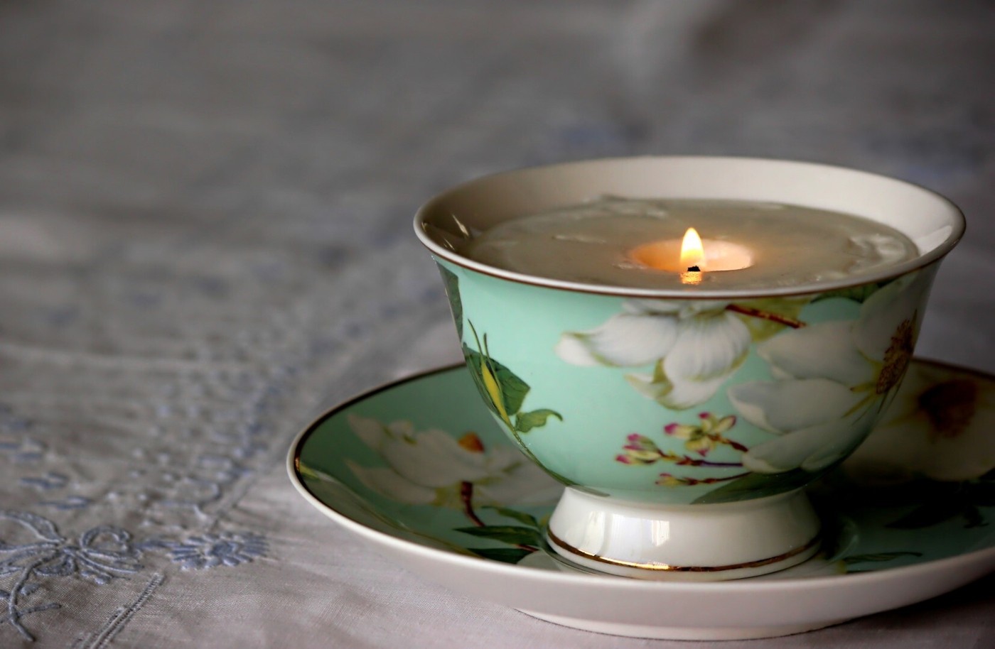 Cup with a candle