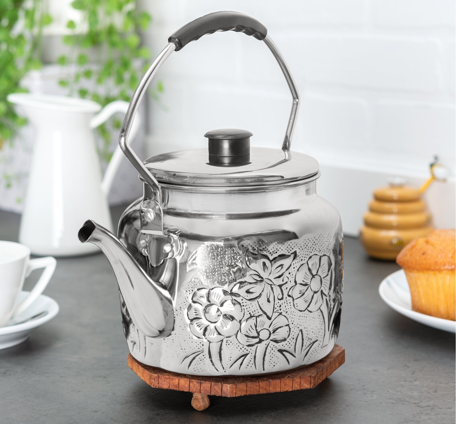 Fun embossed design tea kettle