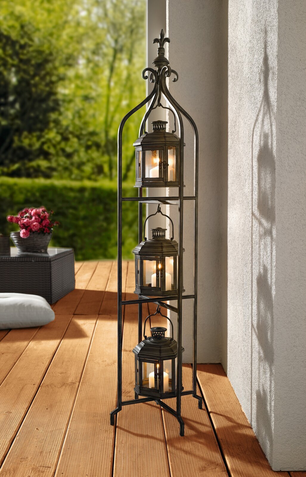 Highly decorative tall wrought iron candle holder