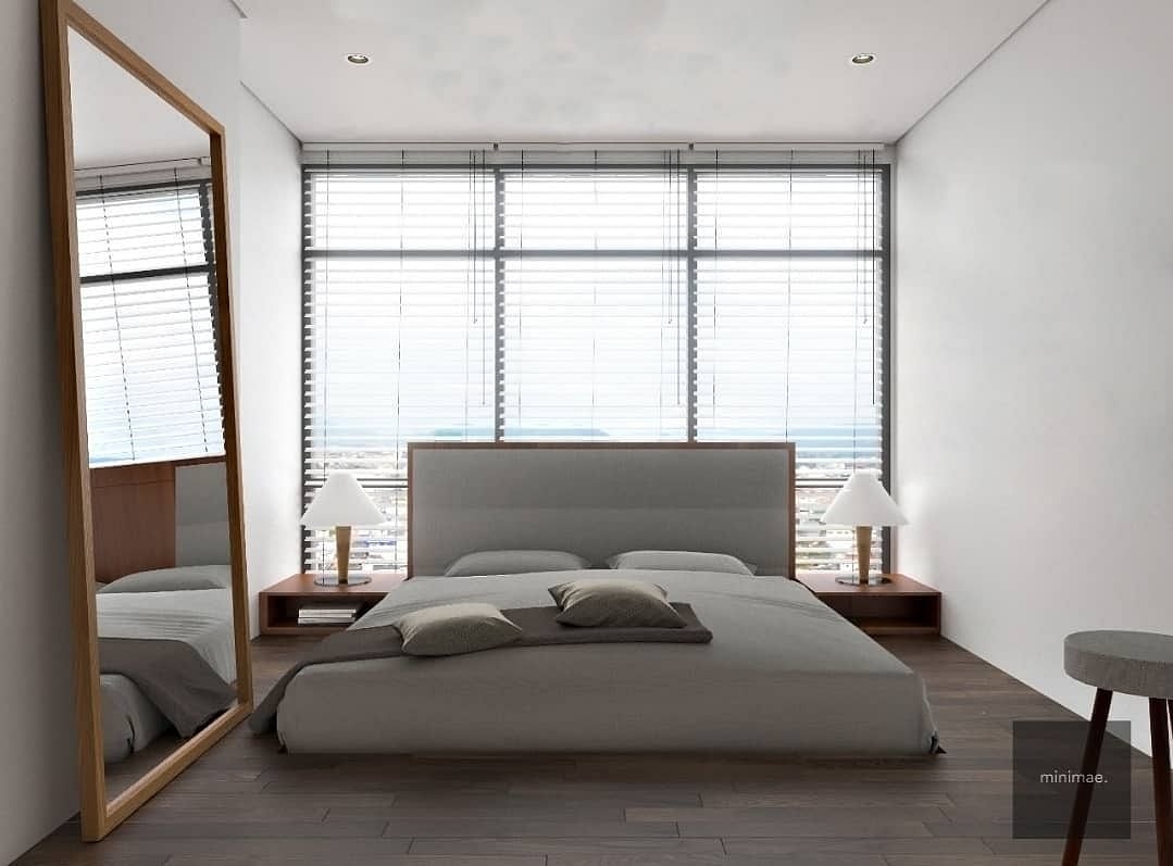 Japandi bedroom with a large mirror