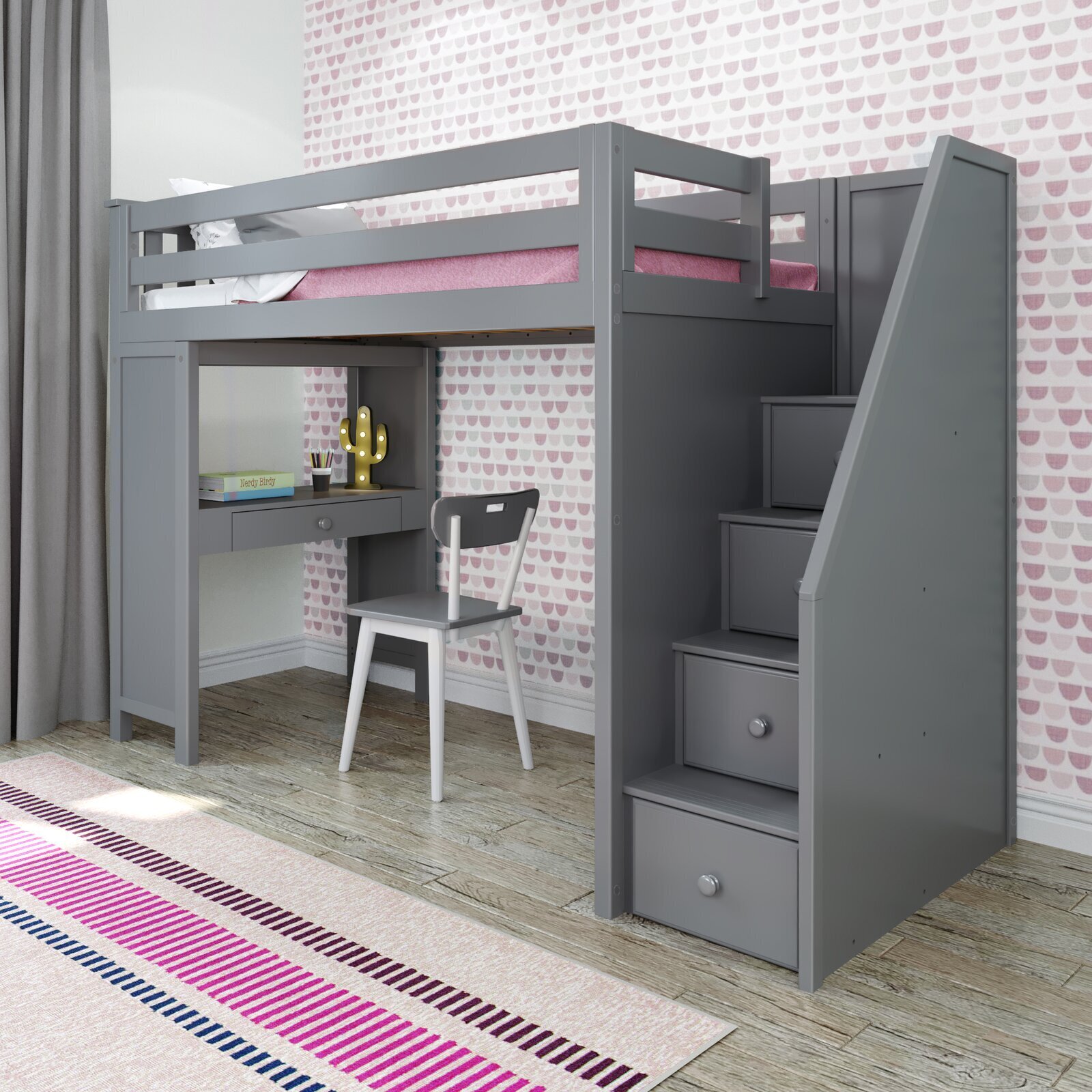 Loft bed with stairs, a small desk, and bottom space