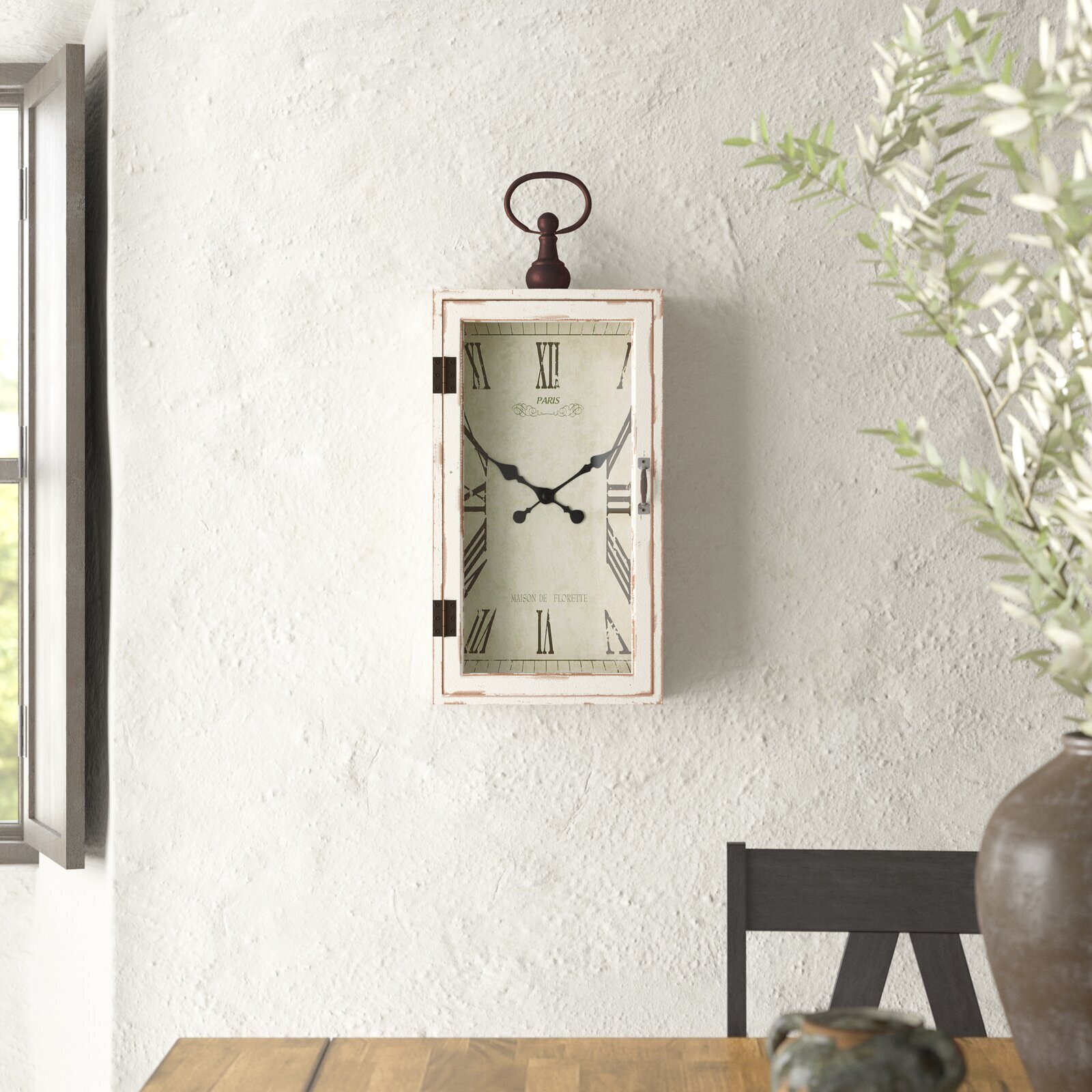 Long clock with a decorative, frame style case