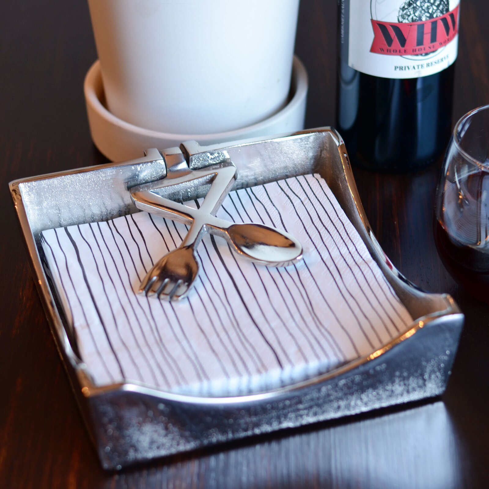 Napkin holder with weight and culinary inspiration