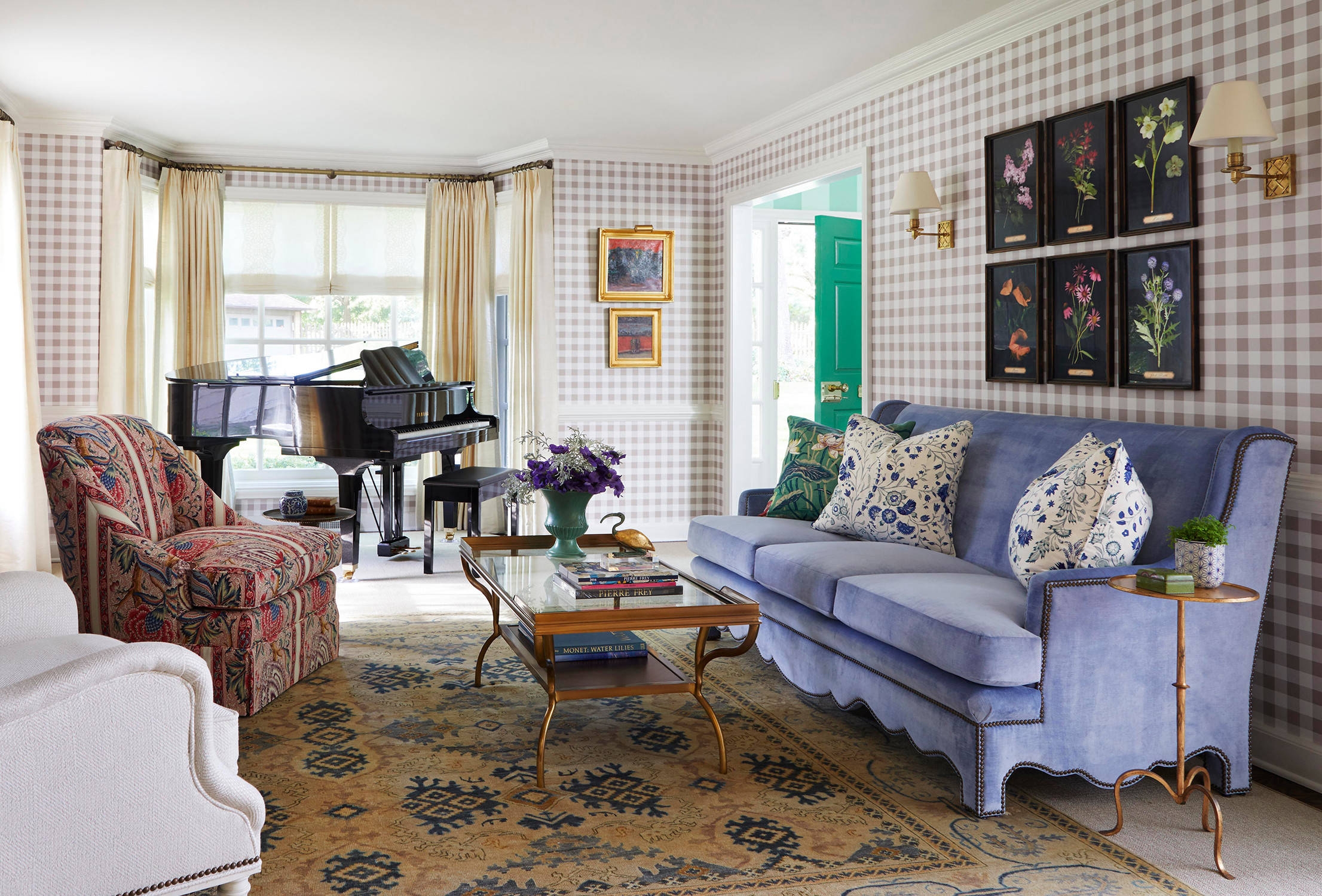 Room with gingham walls and very peri sofa