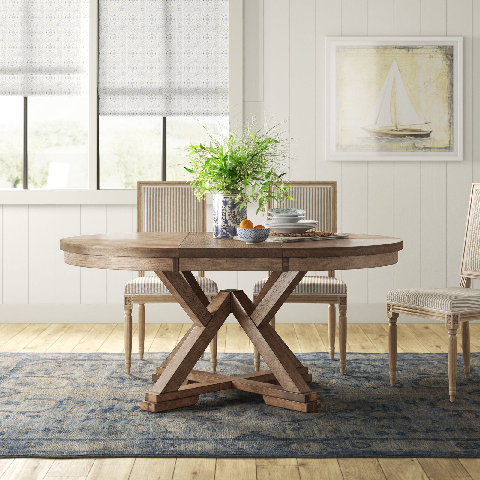 Round butterfly leaf table with geometric base 