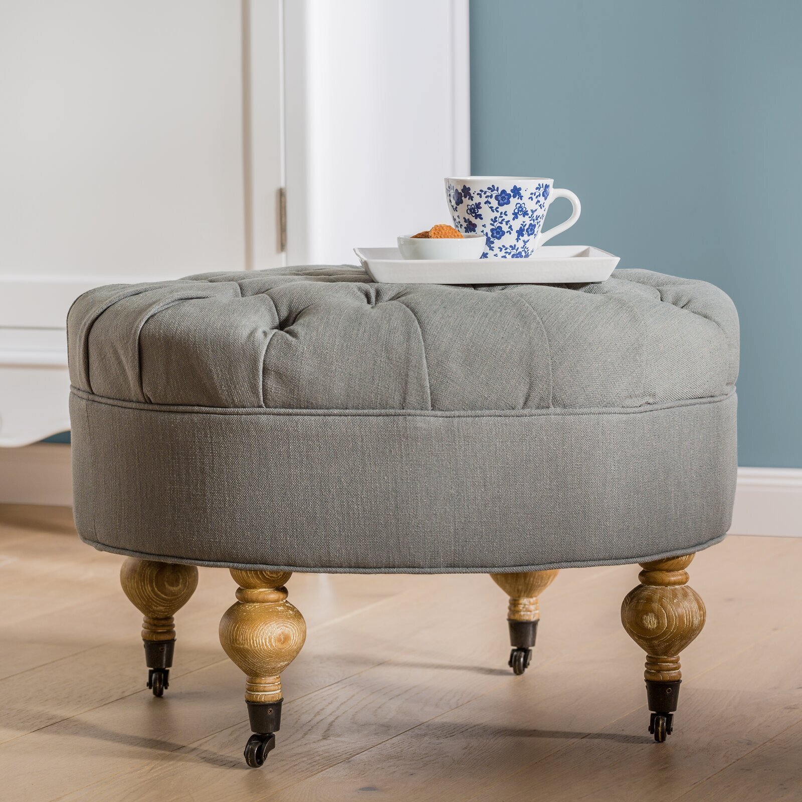 Sophisticated Round Ottoman on Wheels