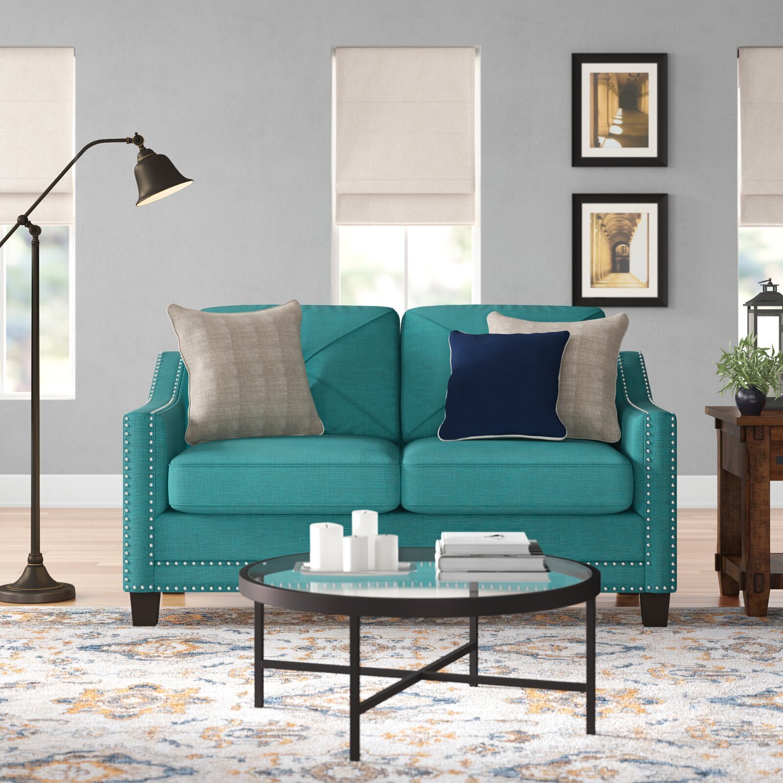Teal Couch with Nail Head Trim