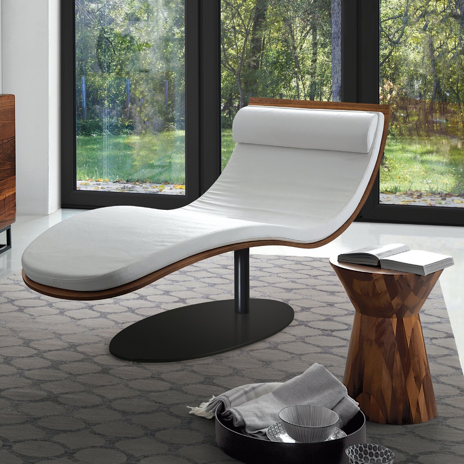 White leather chaise lounge chair with pedestal base