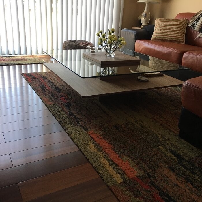 Aiofe Pedestal Coffee Table with Storage