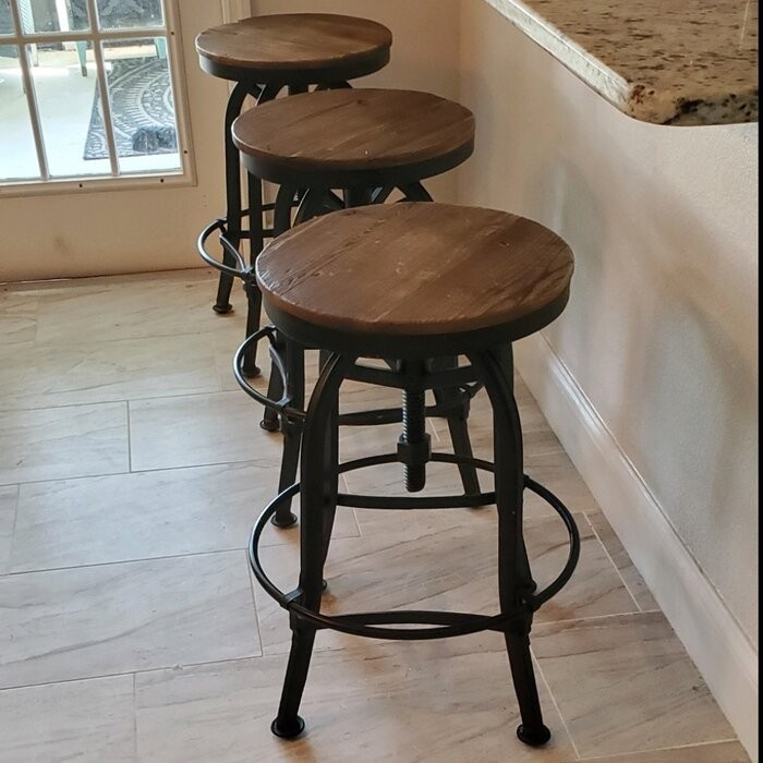 Cothern Swivel Solid Wood Adjustable Height Bar Stool