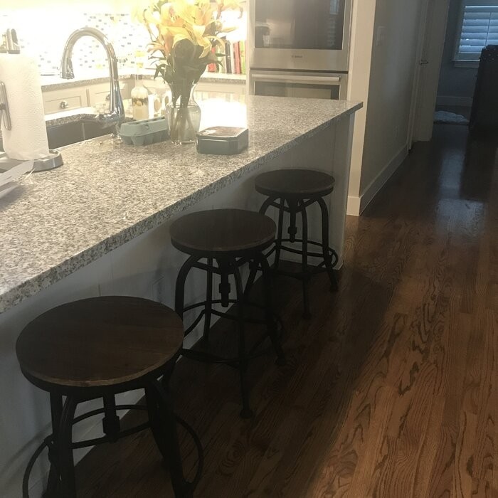 Cothern Swivel Solid Wood Adjustable Height Bar Stool