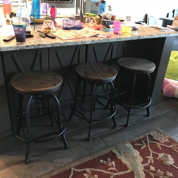 Cothern Swivel Solid Wood Adjustable Height Bar Stool