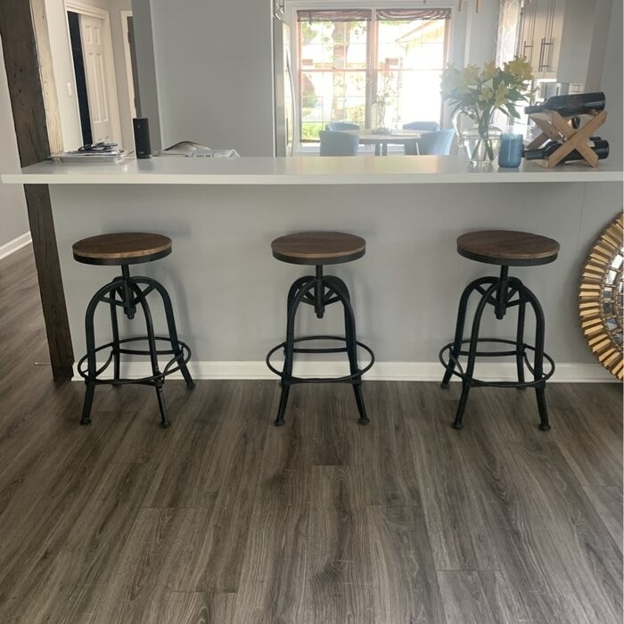 Cothern Swivel Solid Wood Adjustable Height Bar Stool