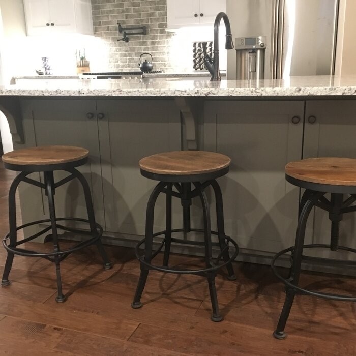 Cothern Swivel Solid Wood Adjustable Height Bar Stool