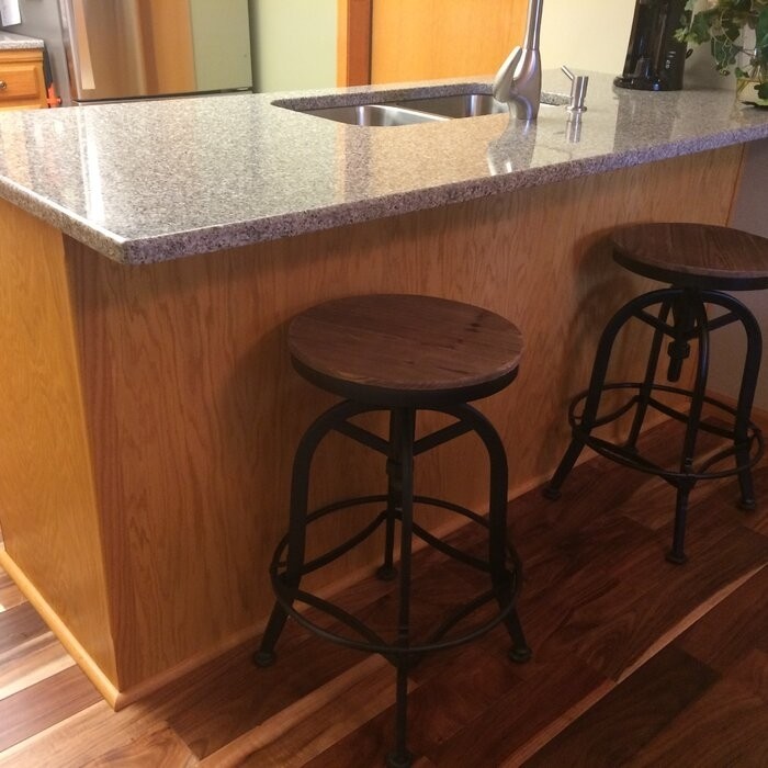 Cothern Swivel Solid Wood Adjustable Height Bar Stool