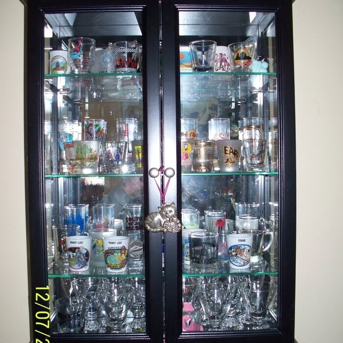 Country Tuscan 20'' Wide Solid Wood Mirrored Back Curio Cabinet