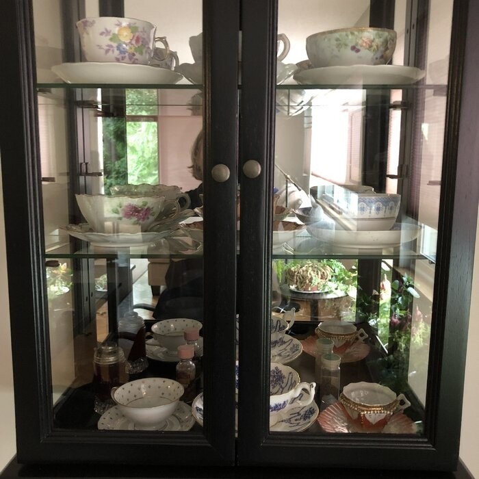 Country Tuscan 20'' Wide Solid Wood Mirrored Back Curio Cabinet