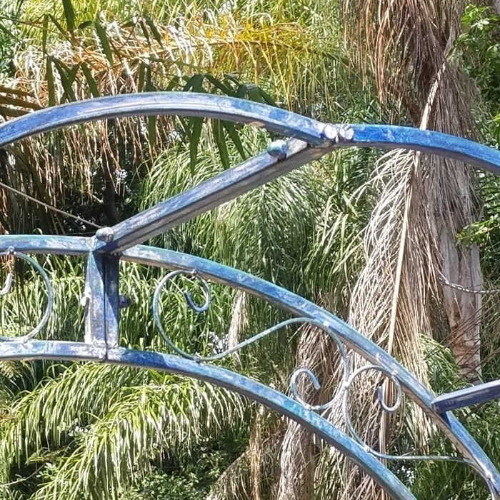 48.5" W x 18.5" D Iron Arbor