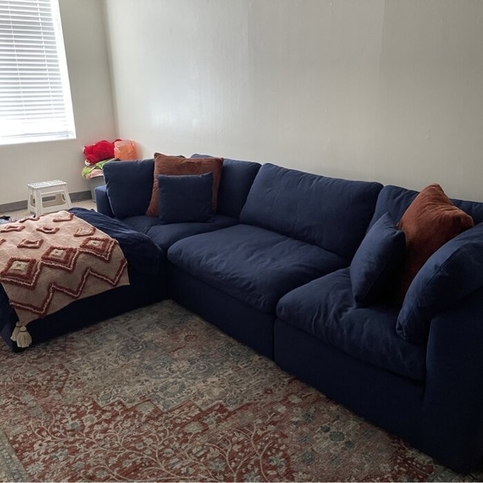 Amillya 119" Wide Reversible Modular Corner Sectional with Ottoman