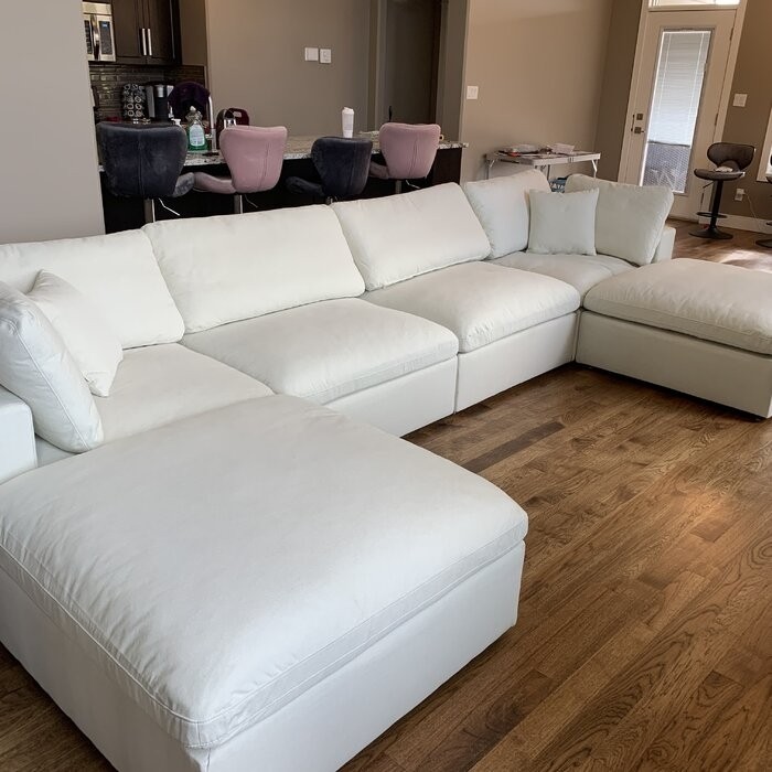 Amillya 119" Wide Reversible Modular Corner Sectional with Ottoman