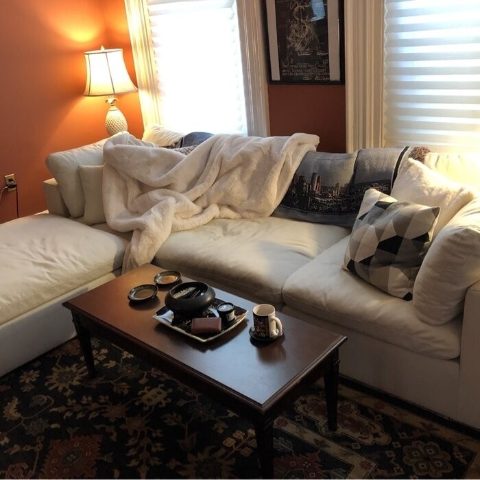 Amillya 119" Wide Reversible Modular Corner Sectional with Ottoman