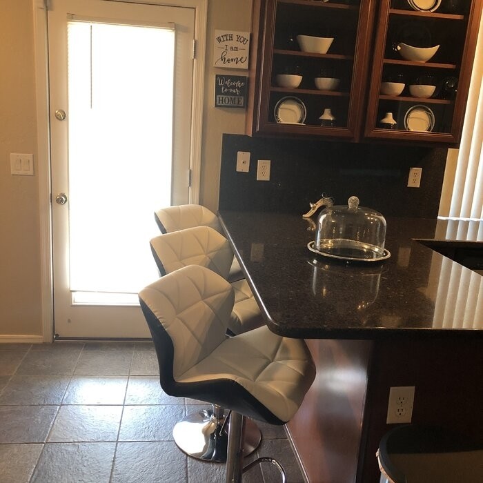 Capodanno Swivel Adjustable Height Bar Stool