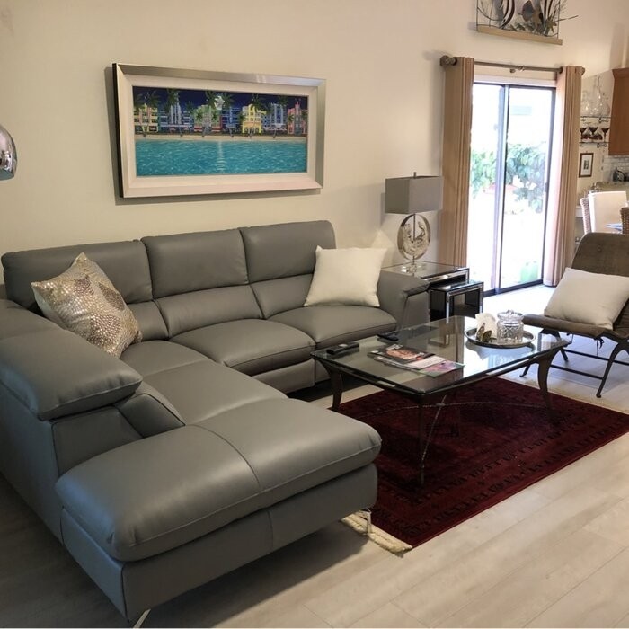 Eatonton 105.8" Wide Genuine Leather Reclining Sofa & Chaise