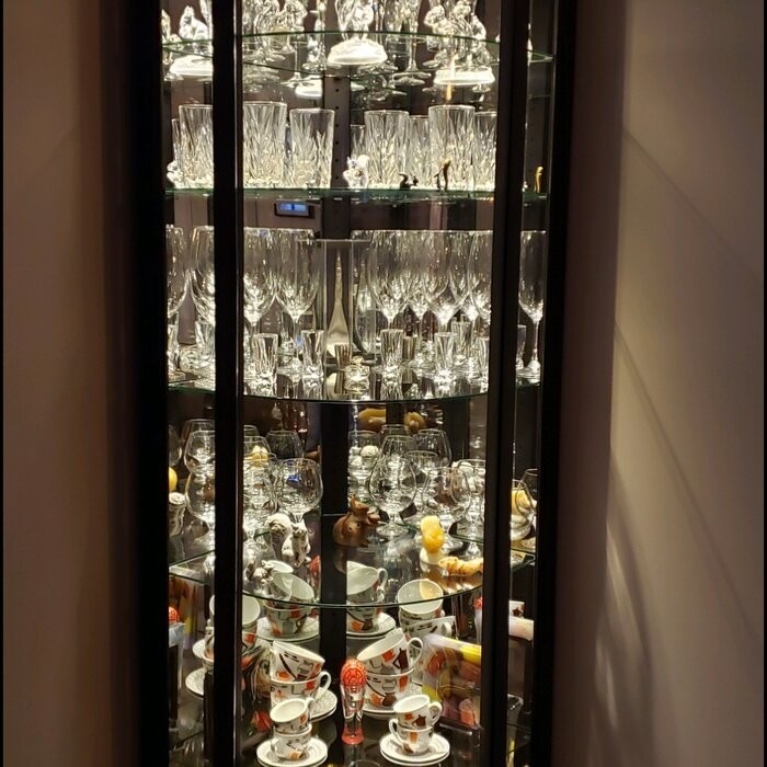 Galghard 32'' Wide Solid Wood Mirrored Back Curio Cabinet with Lighting