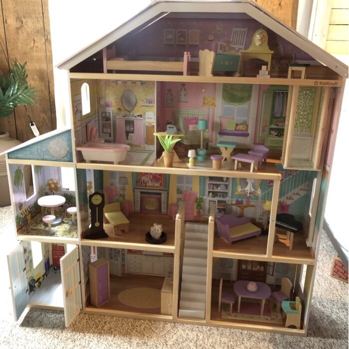 big wooden doll house