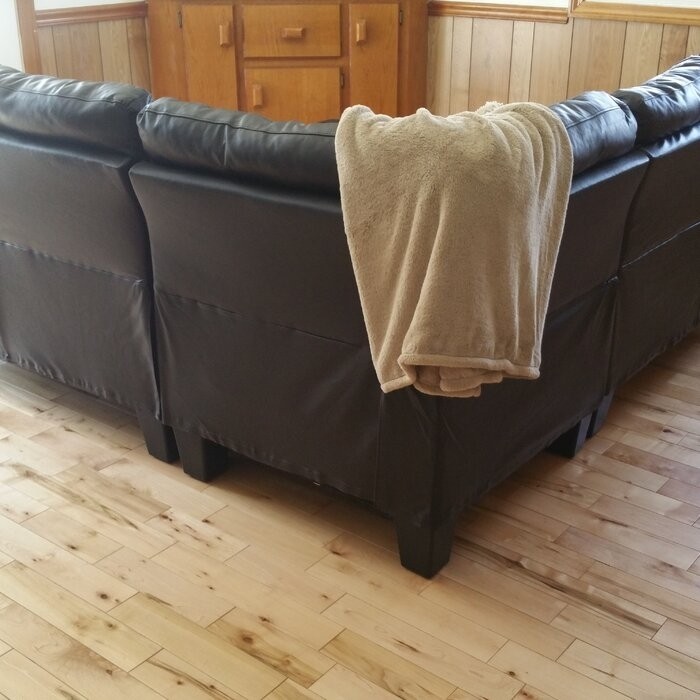Karsyn 84" Wide Faux Leather Symmetrical Corner Sectional with Ottoman