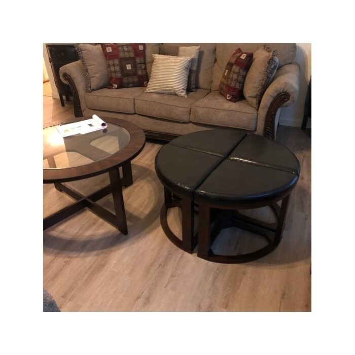 Landaverde Coffee Table with Nested Stools