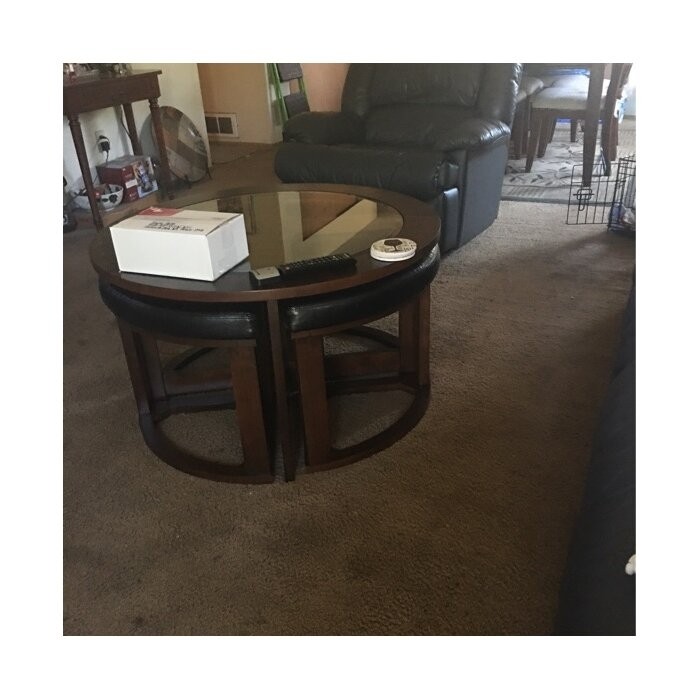 Landaverde Coffee Table with Nested Stools