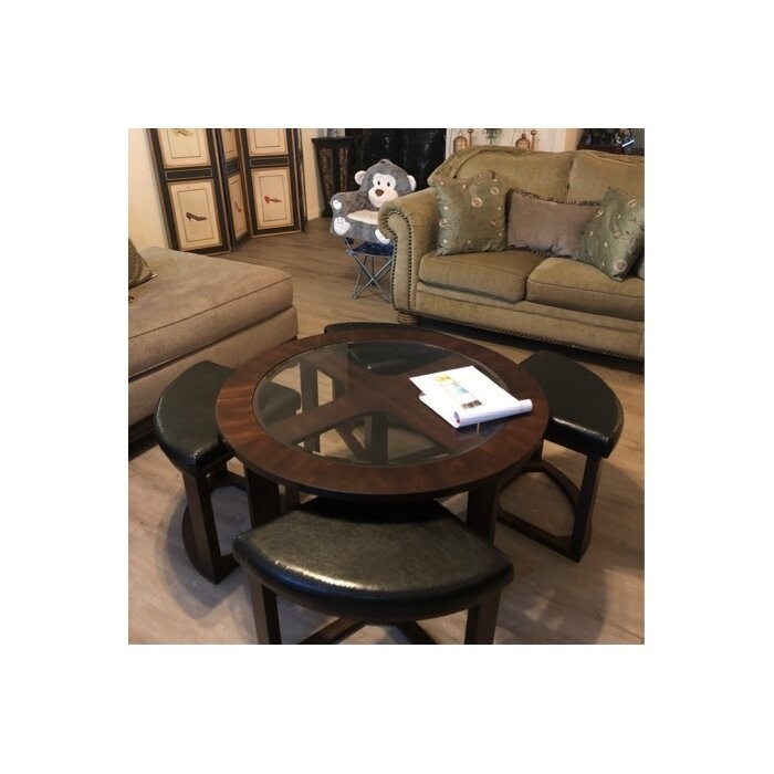 Landaverde Coffee Table with Nested Stools