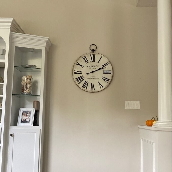Oversized Jamel Round Metal with Top Loop 24.21" Wall Clock