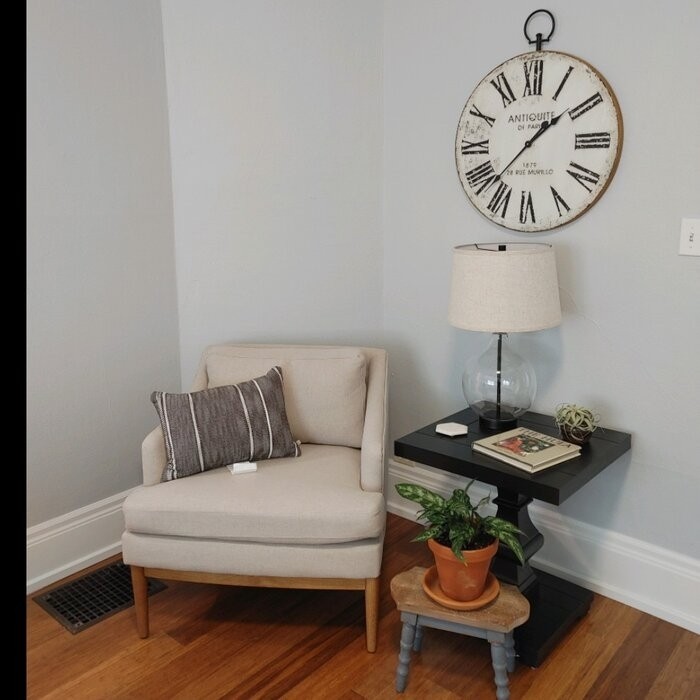 Oversized Jamel Round Metal with Top Loop 24.21" Wall Clock