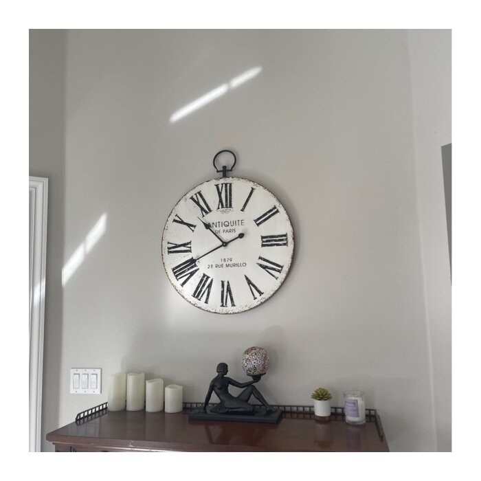 Oversized Jamel Round Metal with Top Loop 24.21" Wall Clock