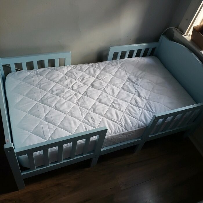 Portland Toddler Solid Wood Convertible Bed by Harriet Bee