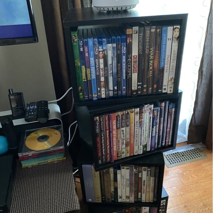 Rotating Multimedia Cube Storage Tower