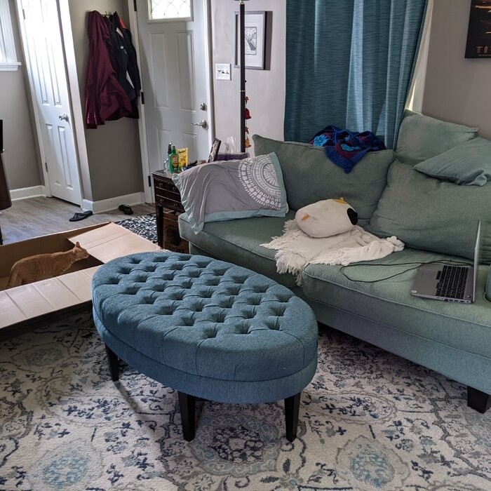 48'' Wide Tufted Oval Cocktail Ottoman