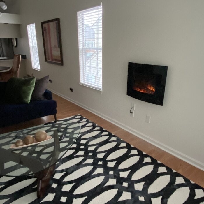 Bartow 25.5'' W Surface Wall Mounted Electric Fireplace