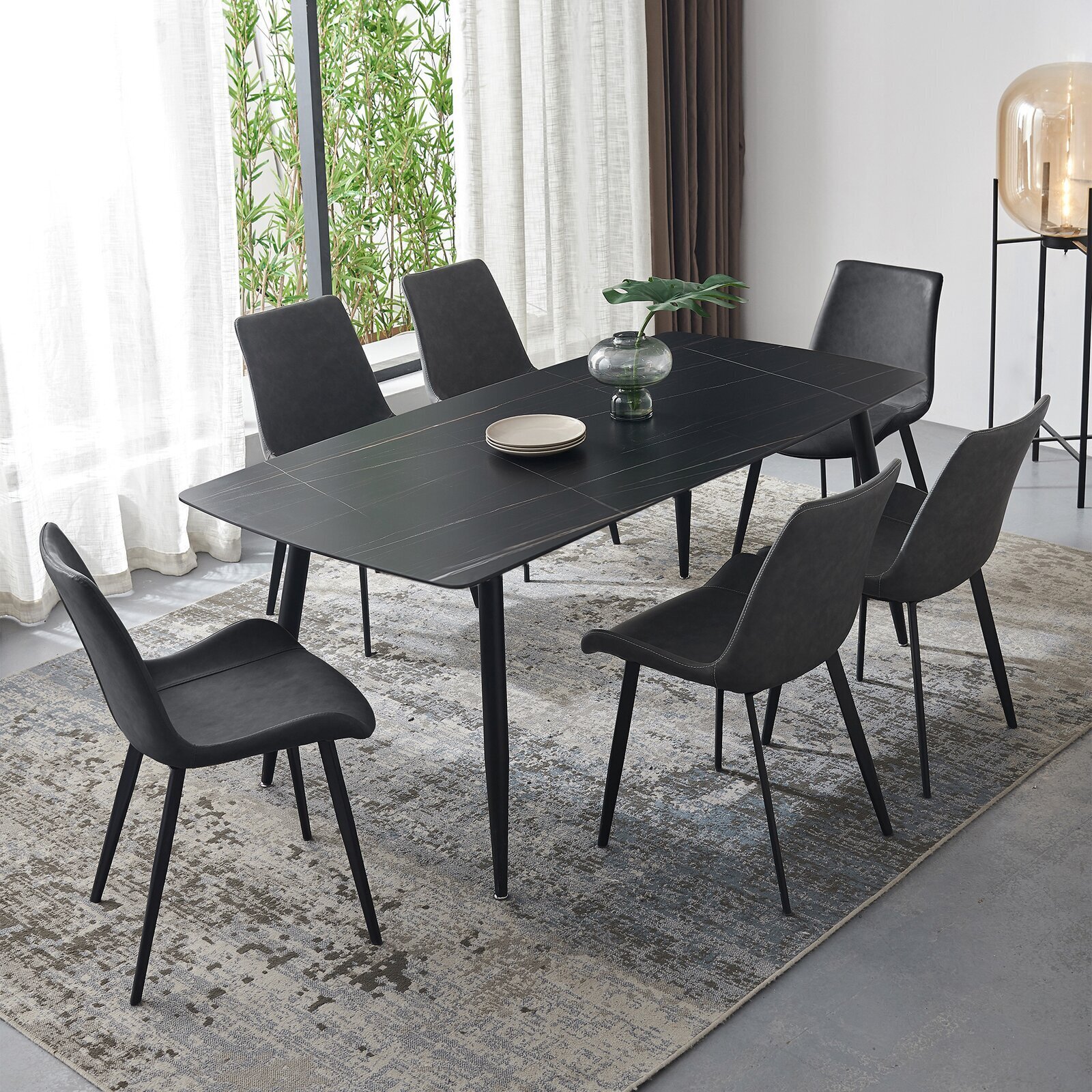Black granite dining table set with a Scandi design