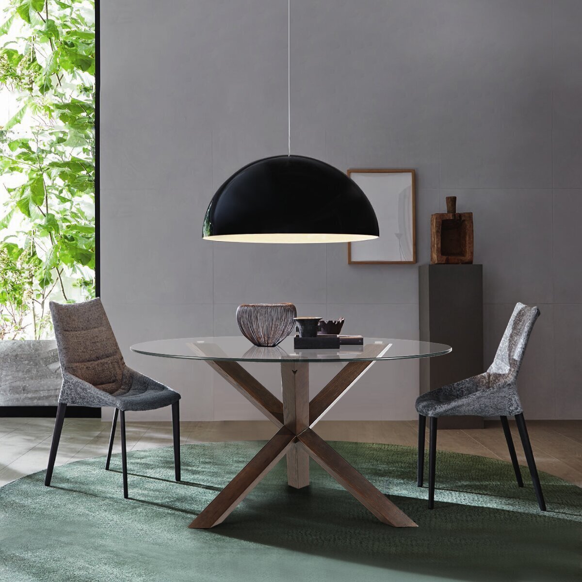 Contemporary star shaped base for round glass dining table