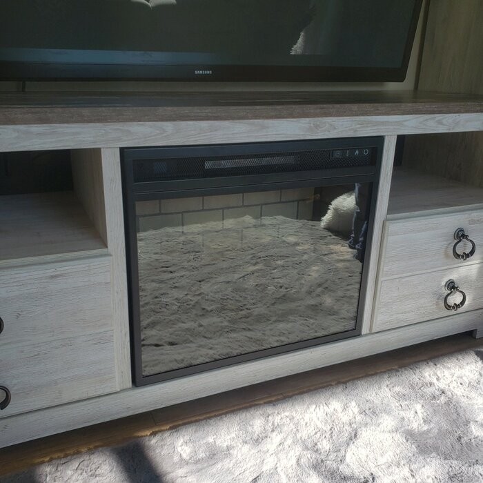 Janenna Entertainment Center for TVs up to 60" with Fireplace Included