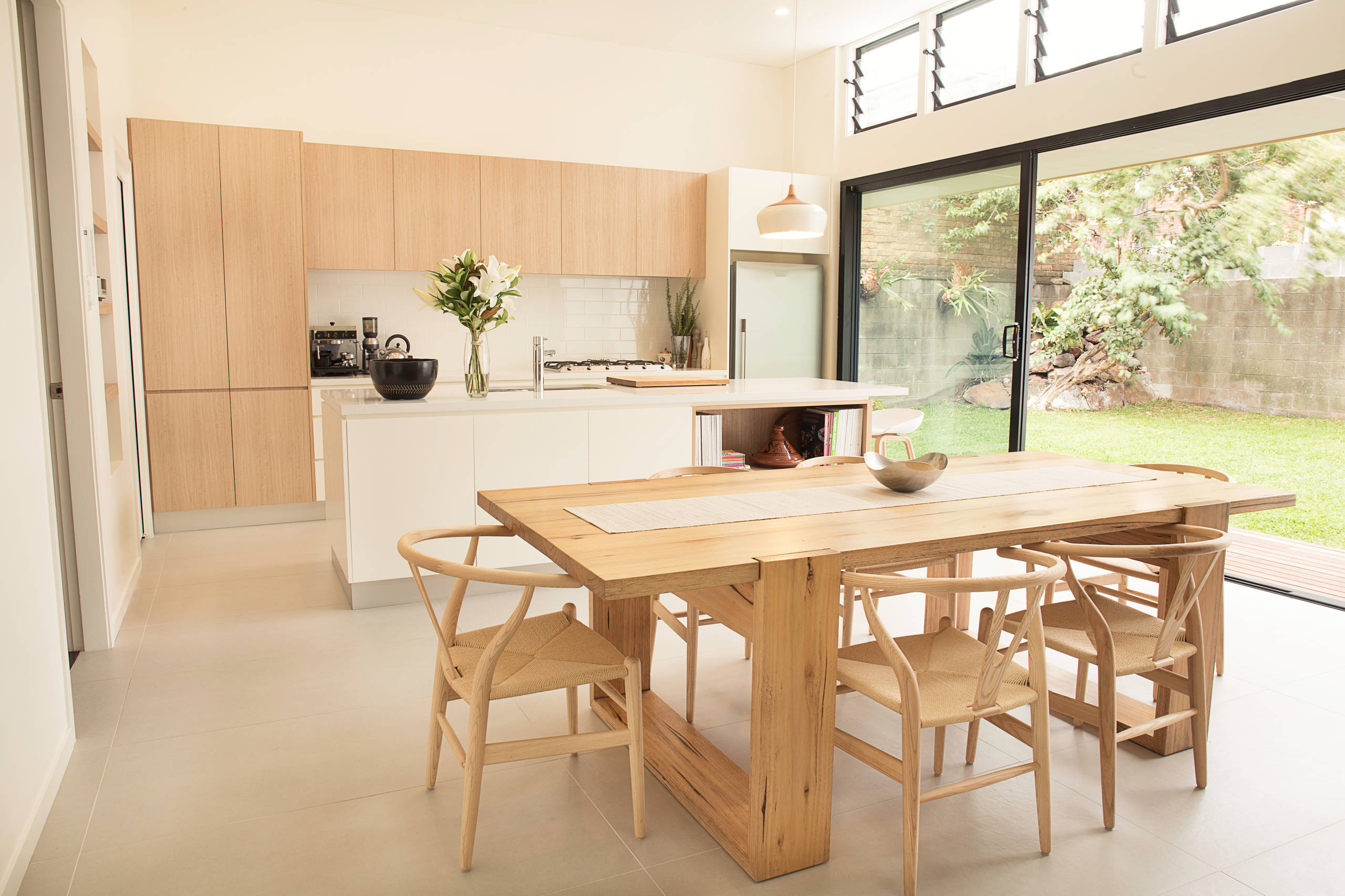 Japandi Kitchen With Natural Wood Cupboards And Table 