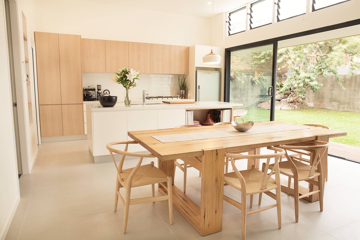 japandi-kitchen-with-natural-wood-cupboards-and-table.jpg